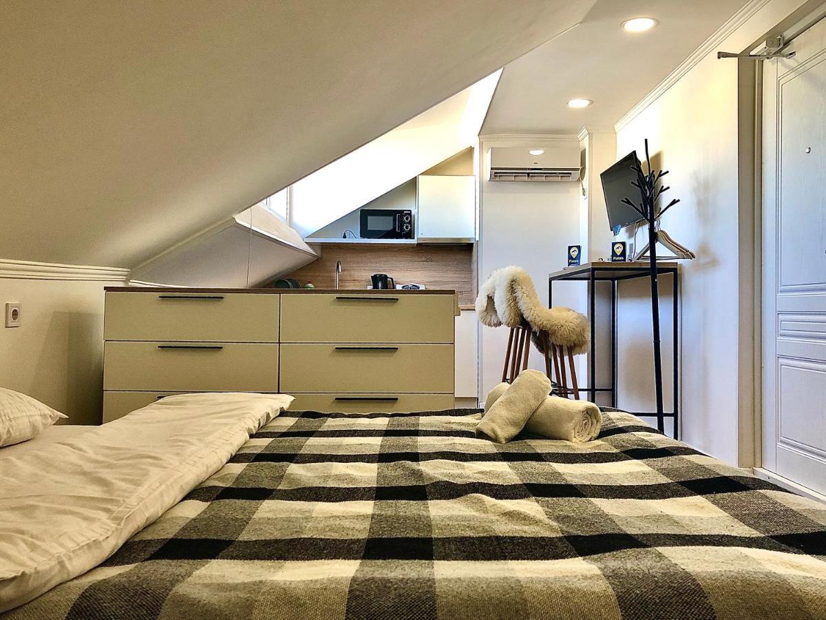 Nordian Aparthotel Харков Стая снимка